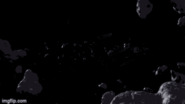 a black and white photo of a space ship flying through space .