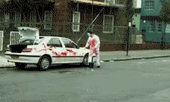 Jason Voorhees Cleaning GIF - Jason Voorhees Cleaning Car GIFs