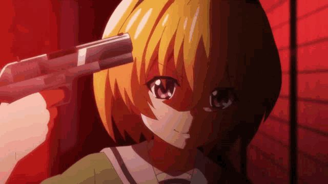 a girl with a gun pointing at her head