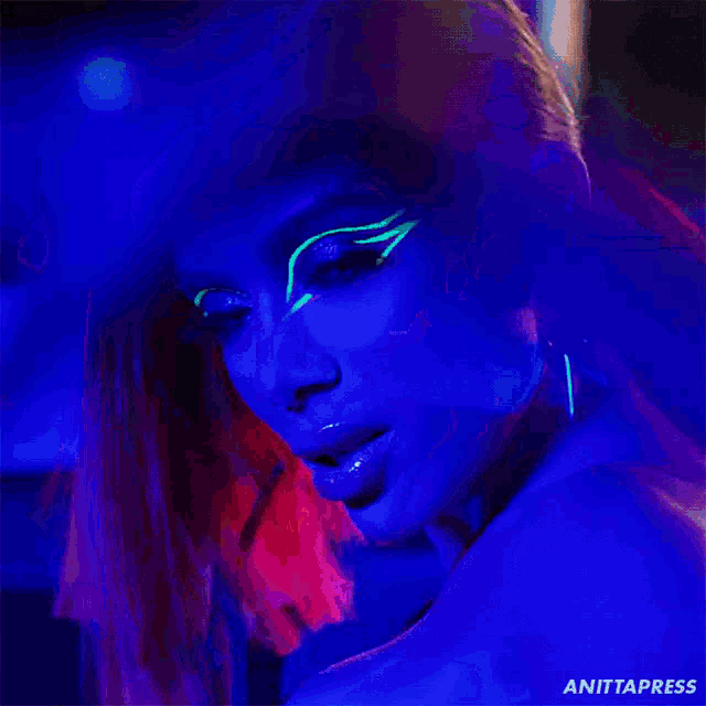 an animated image of a woman with glow in the dark makeup