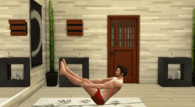 a man is doing a yoga pose on a mat