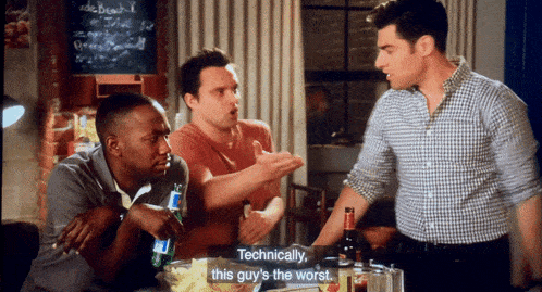 a man says technically this guy 's the worst while another man looks on