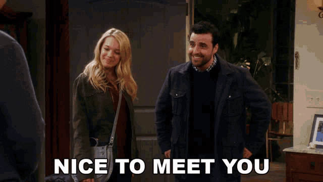 a man and a woman are standing next to each other and the words nice to meet you are above them