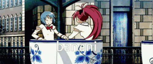 two anime characters are sitting in a blue and white cup with the word banani on it