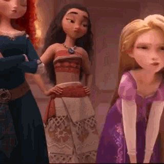 a group of cartoon dolls are standing next to each other .
