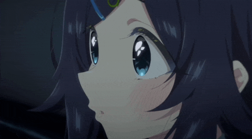 a close up of a girl 's face with a blue eye