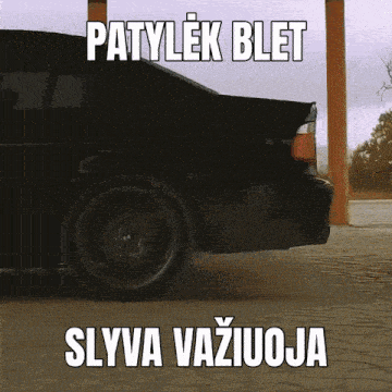 a picture of a car with a caption that says patylek blet slyva vaziuoja