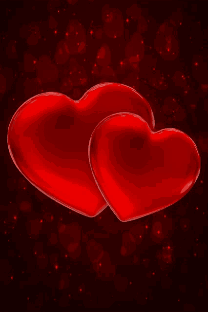 two red hearts on a red background with stars