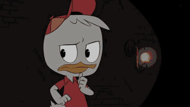 a cartoon duck with a red hat is looking at a light in a dark room