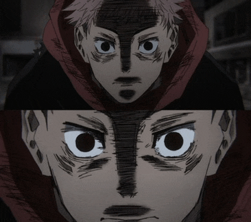 a close up of a person 's face with a hood on