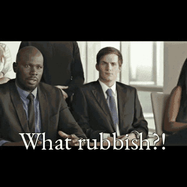 a man in a suit and tie sitting next to another man with the words " what rubbish " on the bottom
