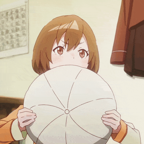 a girl with brown hair and red eyes is holding another girl