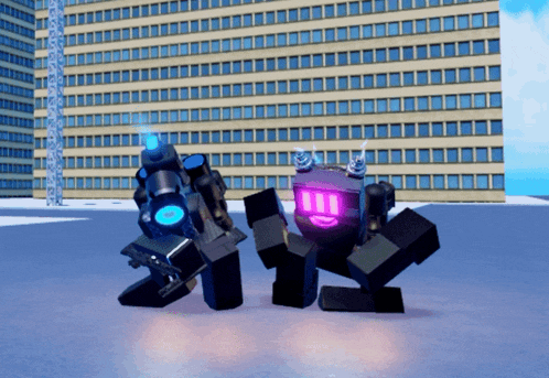 two robots are standing next to each other in front of a tall building
