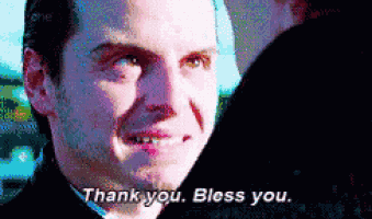 a close up of a man 's face with the words thank you bless you