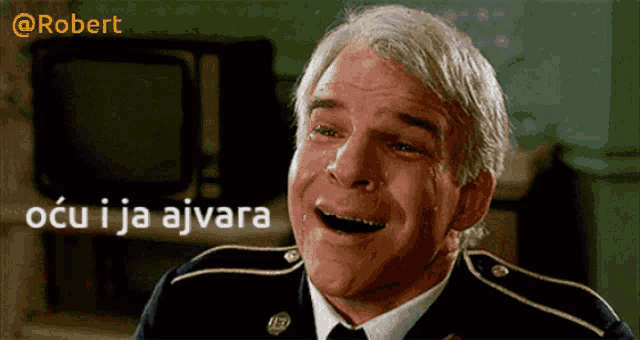 a man in a military uniform with a caption that says ' ocu i ja ajvara ' on it