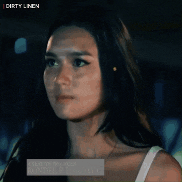 a woman with dirty linen written on the bottom right