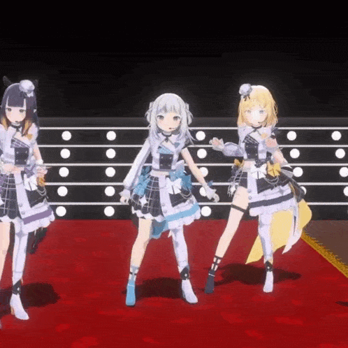 a group of anime girls are dancing on a stage