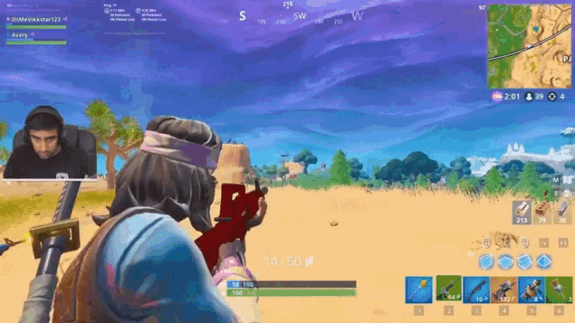 a man is playing a video game called fortnite and has a score of 14-50