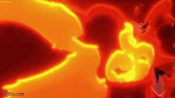 a close up of a person 's face with flames coming out of it 's mouth .