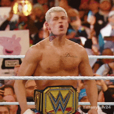 a shirtless wrestler in a ring with a belt that says ' dream ' on it