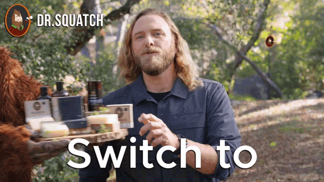 a man is holding a tray of soap and the words switch to are above him