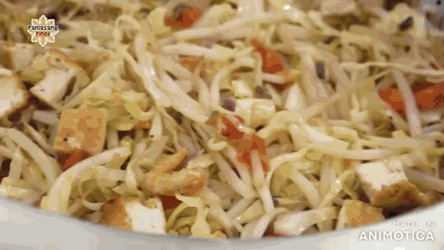a close up of a salad with the words made in animatica on the bottom right