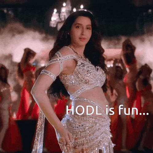 a woman in a white dress is dancing with the words hodl is fun behind her