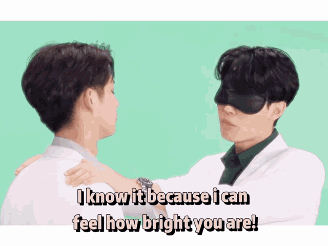 a man wearing a blindfold talks to another man with the words " i know it because i can feel how bright you are "