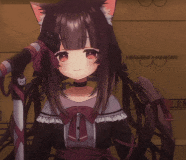 a girl with a cat ear is standing in front of a microphone that says big on it