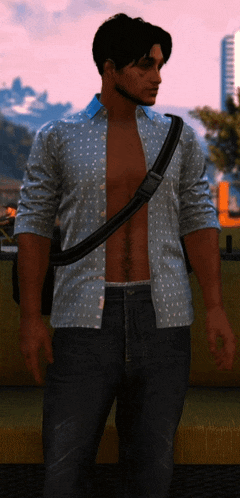 a man without a shirt is wearing a blue shirt with white dots