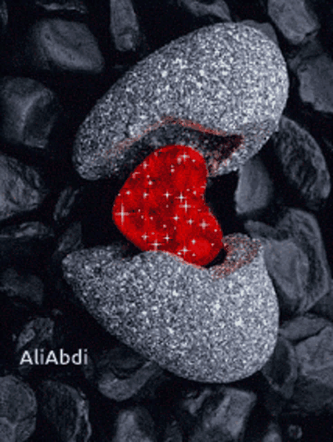 a picture of a broken rock with a red heart in it