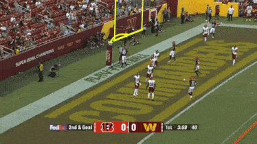 a football game is being played with a score of 1 to 0