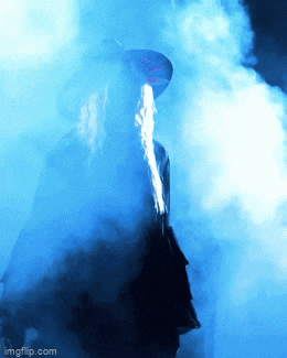 a person in a hat is surrounded by blue smoke with imgflip.com at the bottom of the image