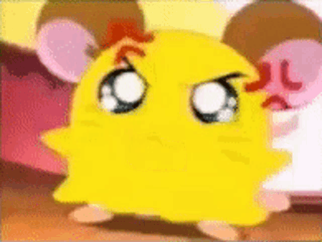 a close up of a yellow cartoon character with an angry look on his face .