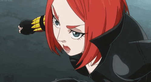 a woman with red hair and blue eyes is wearing a black jacket