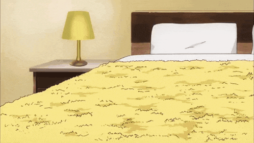 a girl is laying on a bed with her legs outstretched and smiling