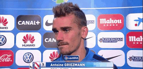 a man with the name antoine griezmann on a screen