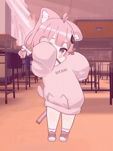 a girl wearing a sweater that says nyan
