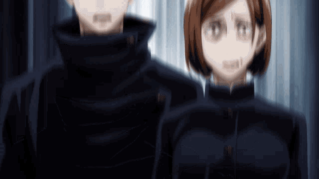 a blurry picture of a man and a woman in uniform