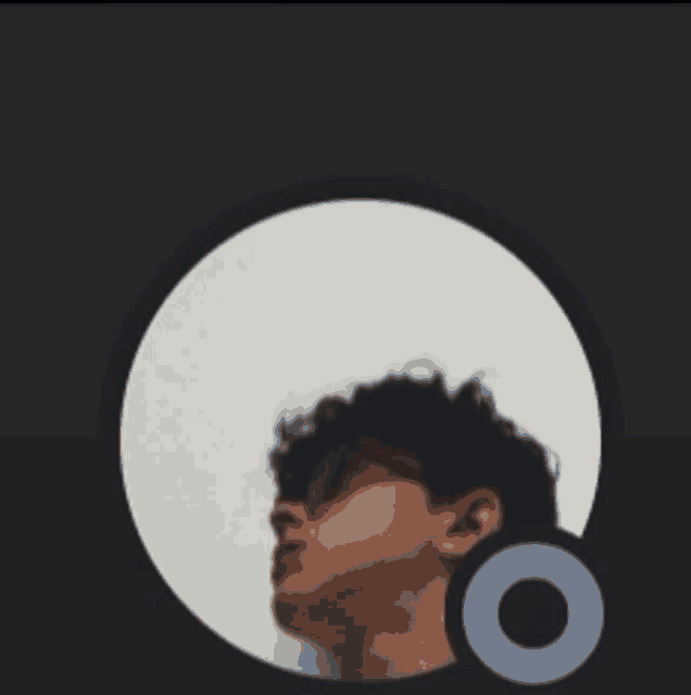 a man wearing sunglasses is in a circle with a blue circle in the middle