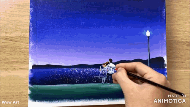 a person is painting a scene with the words wow art below it