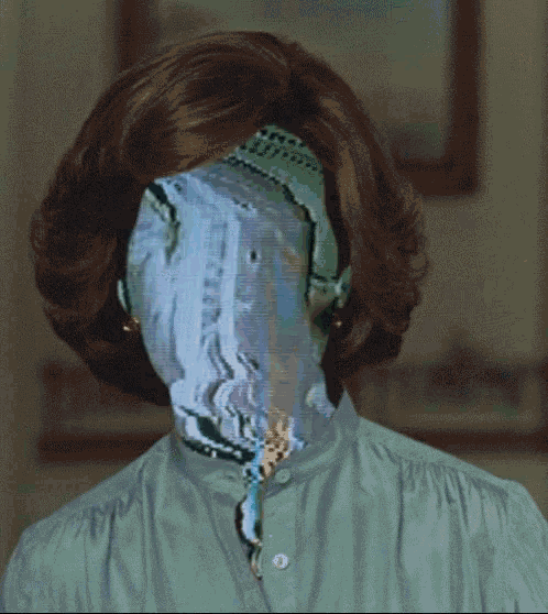 a woman 's face is covered by a painting of a landscape