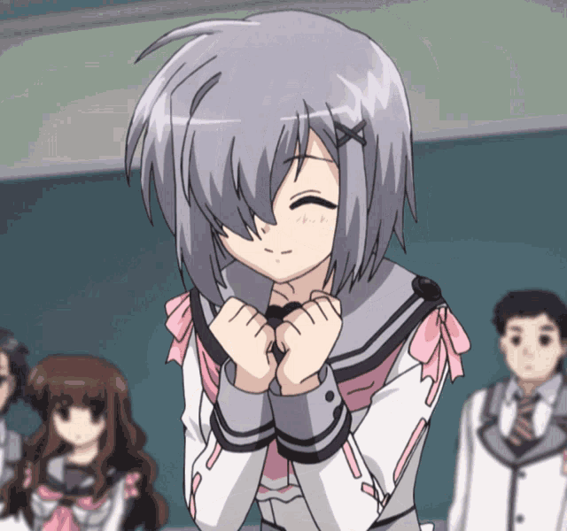 a girl with gray hair is making a funny face with her hands folded