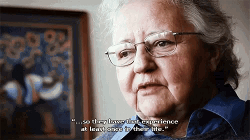 an older woman wearing glasses says " so they have that experience at least once in their life .. "