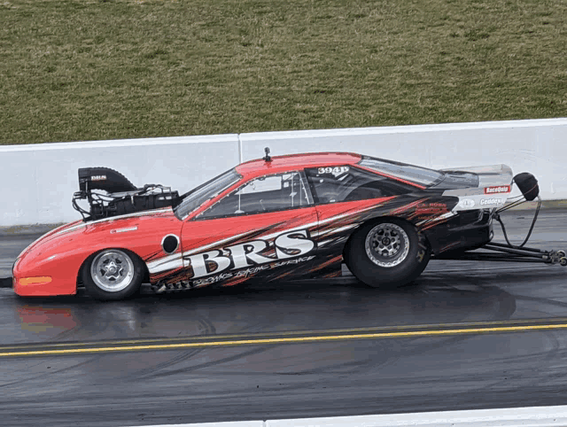 a race car with brs written on the side
