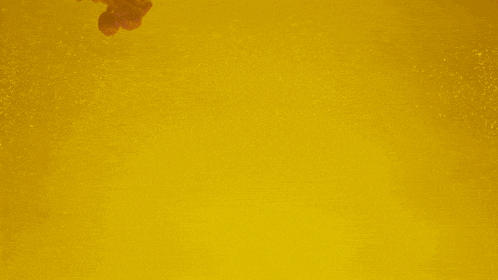 a yellow background with smoke coming out of the bottom