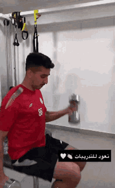a man in a red shirt with the number 88 on it
