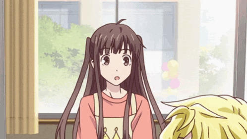 a girl in an apron is standing next to a boy
