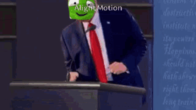 a man in a suit and tie with a mask on his face is giving a speech at a podium .