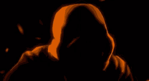 a close up of a person 's face with a glowing light coming out of it .